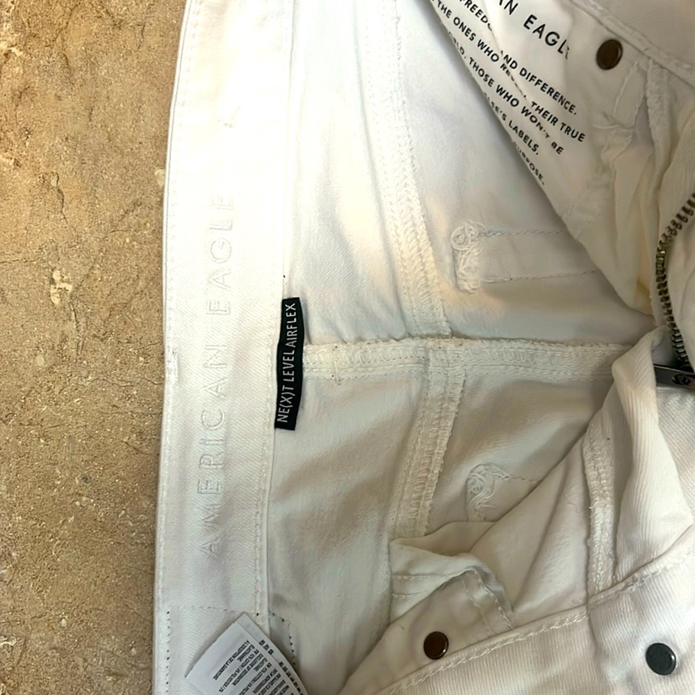 Boys American Eagle Jeans. Wore once, size 28x 30. Color white. Skinny jeans